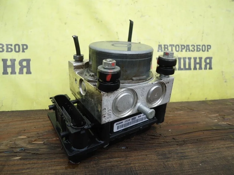 Блок управления ABS Nissan Almera 476604AA0A G15 K4MC697