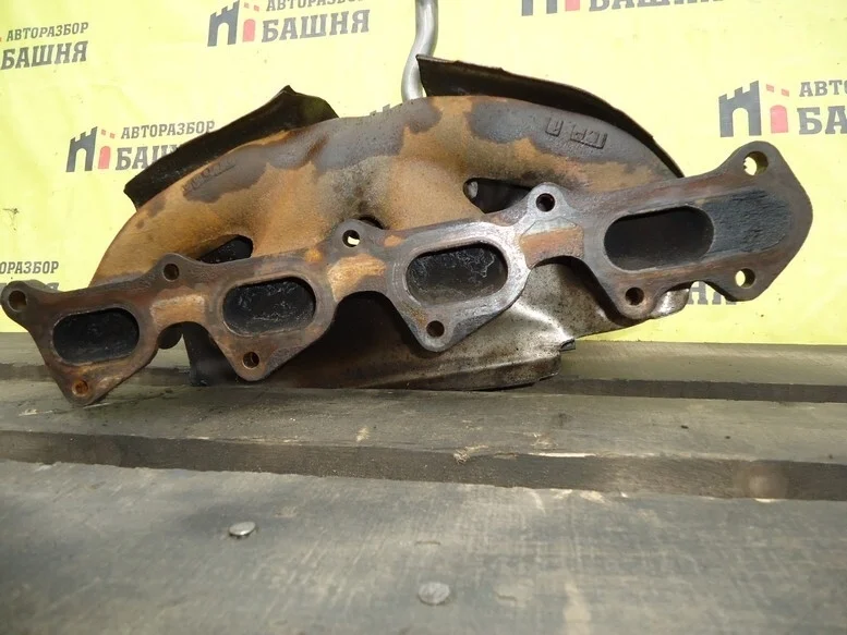 Коллектор выпускной Mitsubishi L200 1555A565 KB4T 4D56