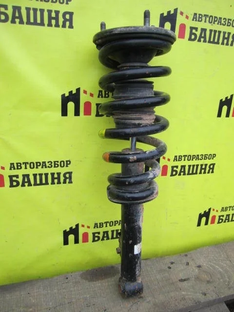 Амортизатор Mitsubishi L200 MR992321 KB4T 4D56, передний