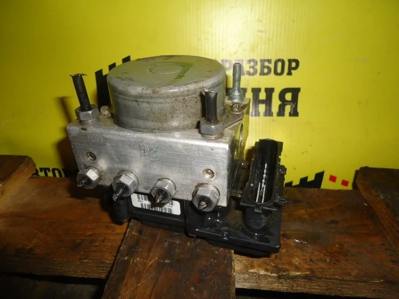 Блок управления ABS Nissan Note 476609U16B E11