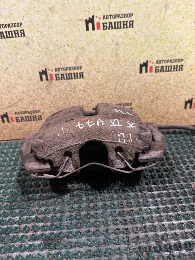 Суппорт тормозной Volkswagen Jetta 2014 1K0615123E CAXA, передний левый