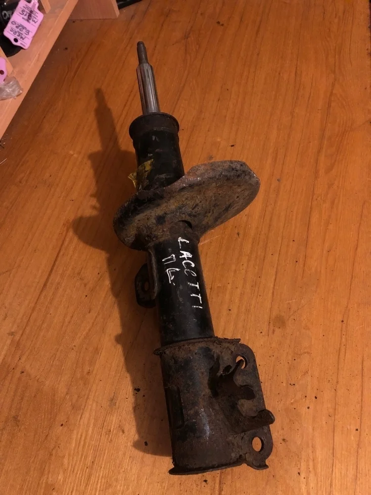 Амортизатор Chevrolet Lacetti 2009 96407819, передний левый