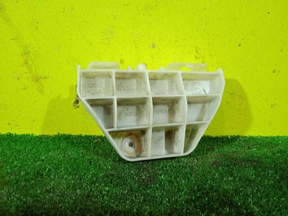 Кронштейн бампера Toyota Corolla 2011 5215812090 150 1ZRFE, задний левый