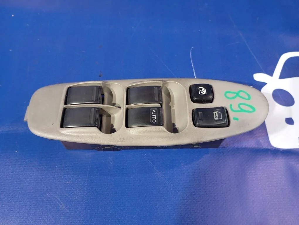 блок управления стеклоподъемниками NISSAN TINO V10 QG18DE F 25401AU000