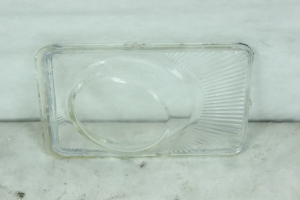 Стекло левой противотуманки Opel Astra H, Zafira B