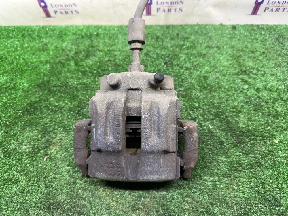 Суппорт тормозной BMW X1 E84