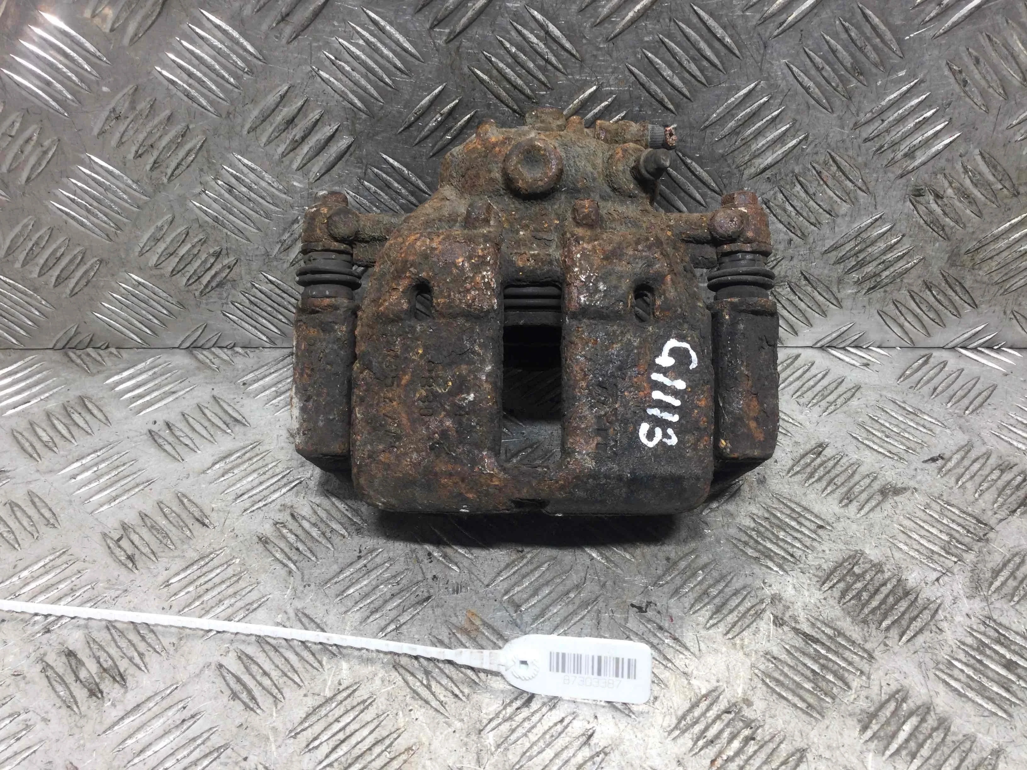 Суппорт передний левый Mitsubishi Colt 6 поколение 2002 - 2008 бензин 1.3 i Механика Х/б