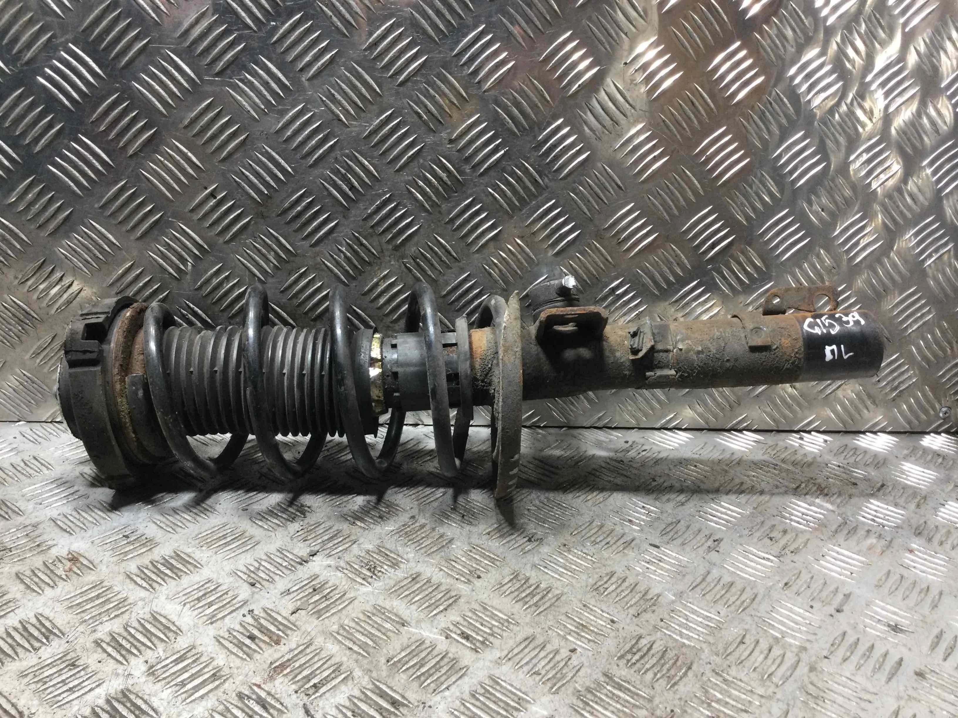 Стойка передняя левая Volkswagen Polo 4 поколение (2001-2005) бензин 1.2 i Механика Х/б