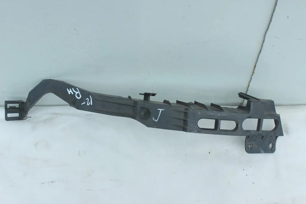 Кронштейн переднего бампера правый Opel Astra J 12-