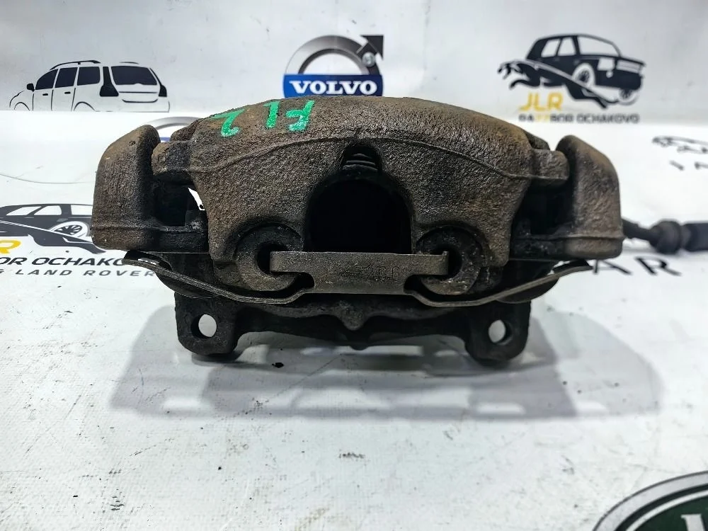 Суппорт тормозной передний левый LR Freelander 2 Freelander II (2006—2010)