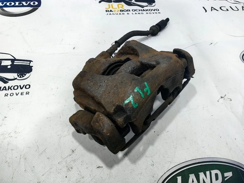 Суппорт тормозной передний левый LR Freelander 2 Freelander II (2006—2010)