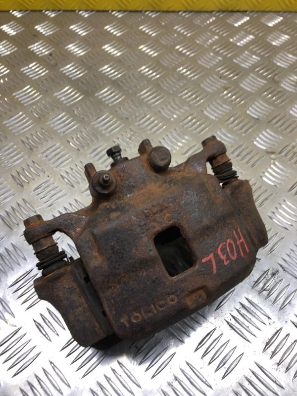 Суппорт передний левый Mitsubishi L200 (2006-2015) 2007 4605A201 ПИКАП 2.5 D 4D56