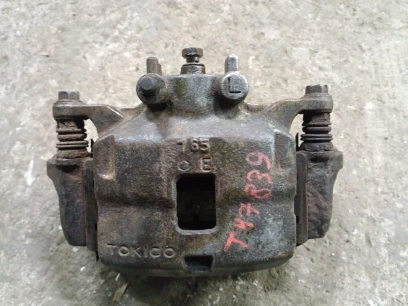 Суппорт передний левый Mitsubishi L200 (2006-2015) 2009 4605A201 ПИКАП 2.5 D 4D56