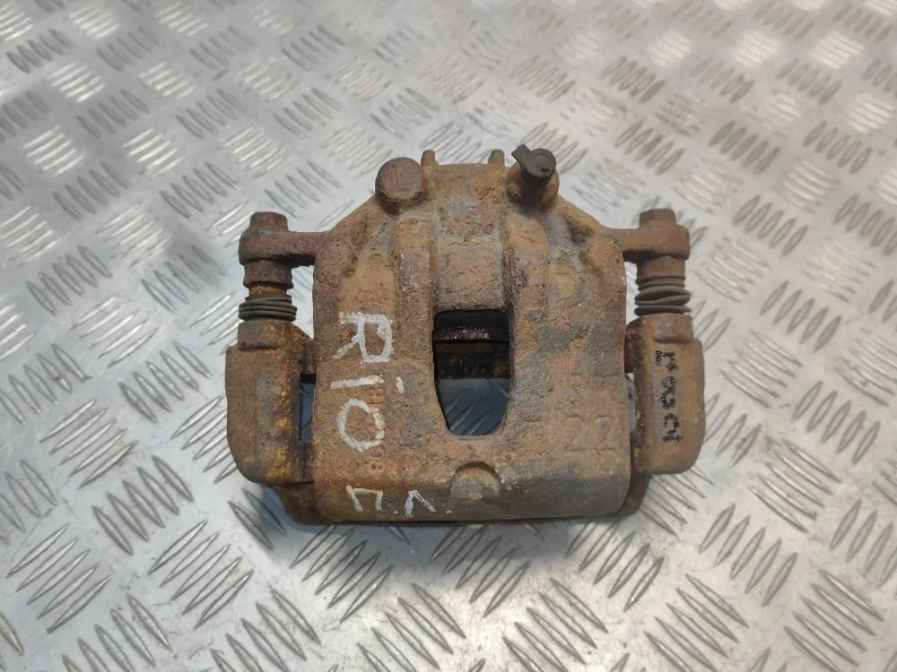 Суппорт передний левый Kia Rio 4