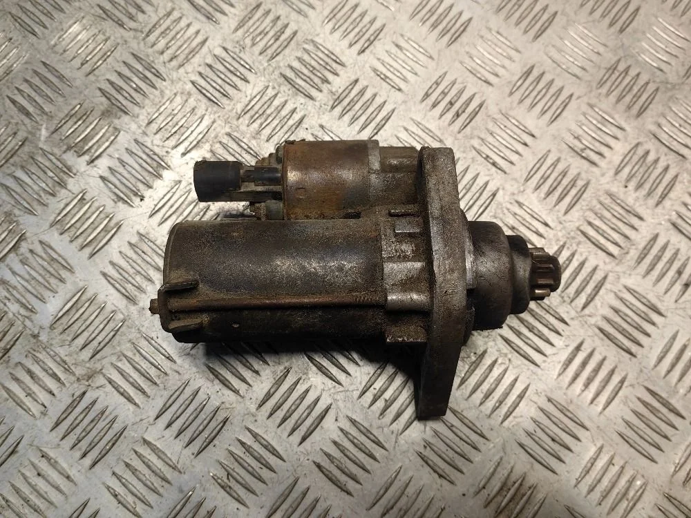 Стартер Volkswagen Passat B6