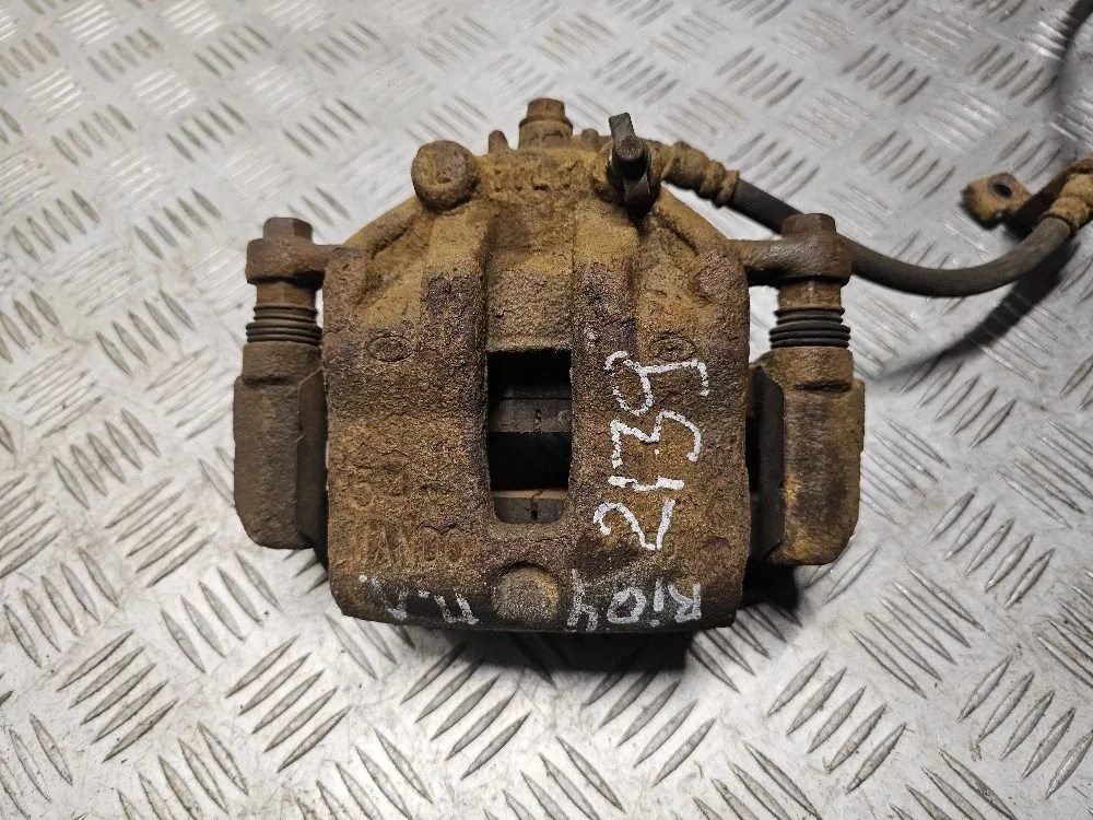 Суппорт передний левый Kia Rio 4