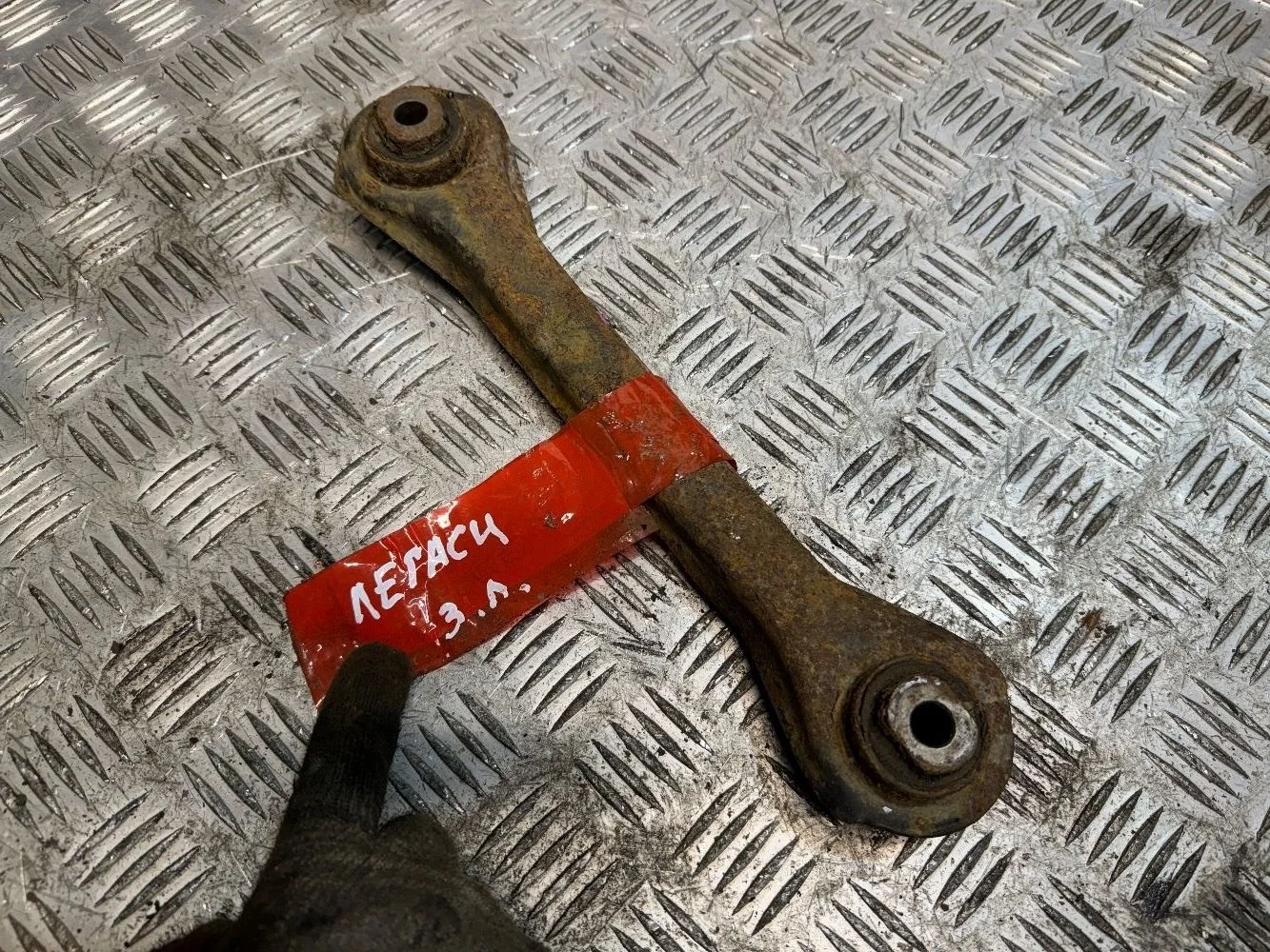 Рычаг задний левый Субару легаси