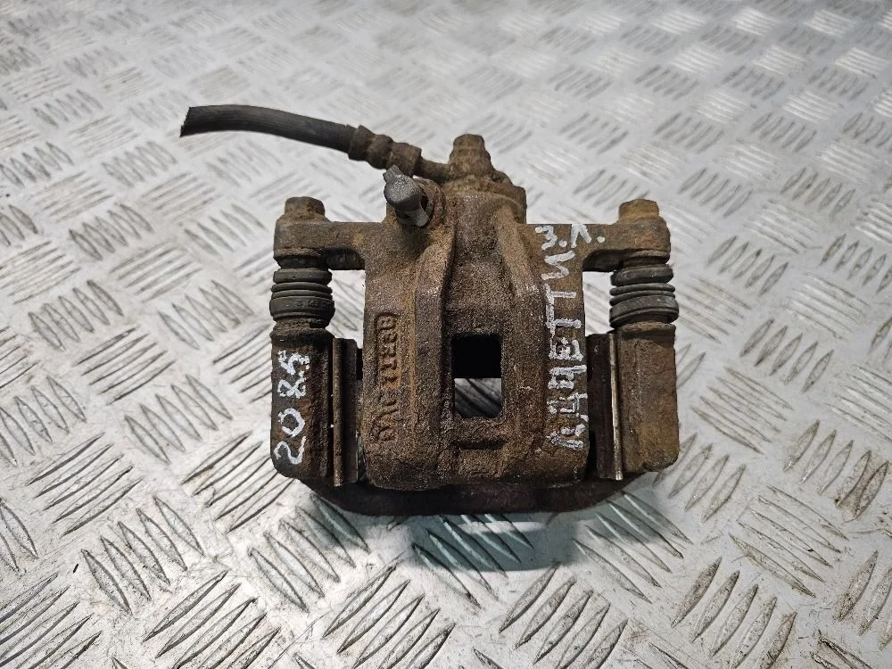 Суппорт задний левый Chevrolet Lacetti