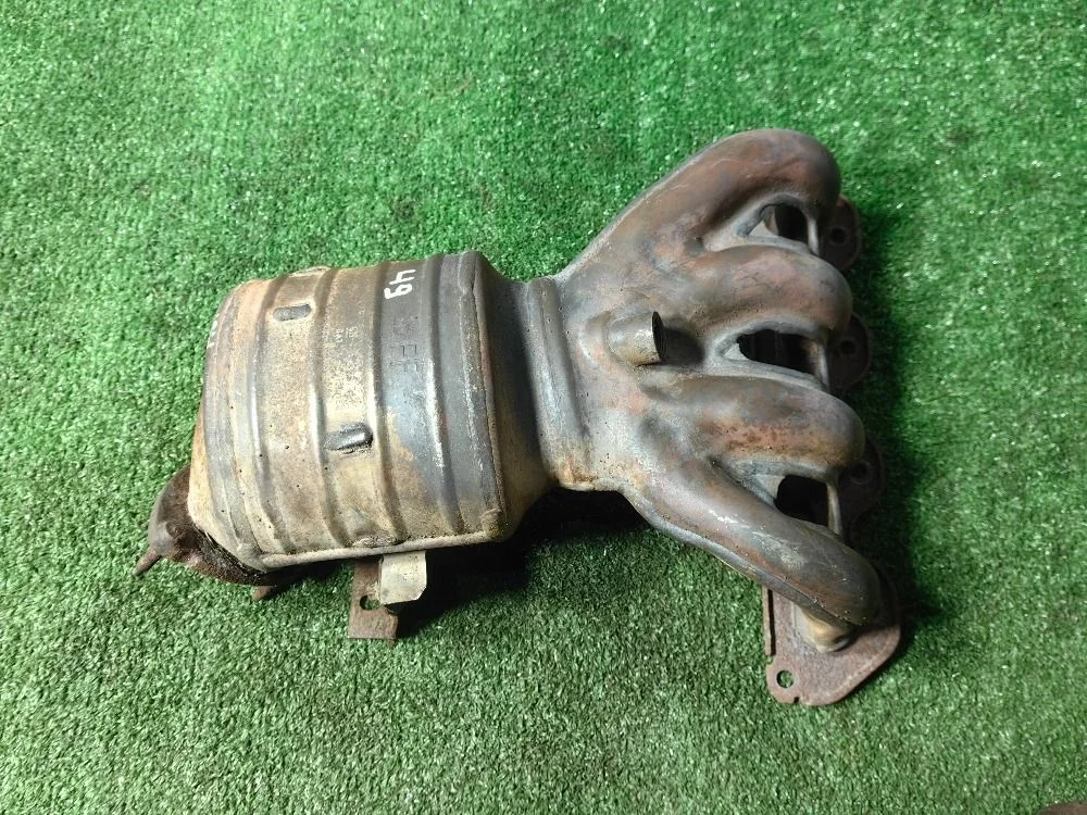 Коллектор выпускной с катализатором Opel Astra H