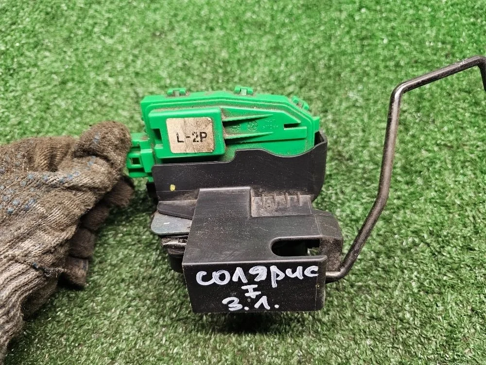 Замок двери задней левой Hyundai Solaris