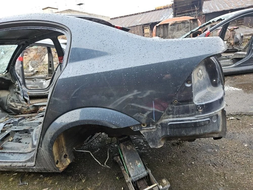 Крыло заднее левое на Opel Astra H 2007 седан