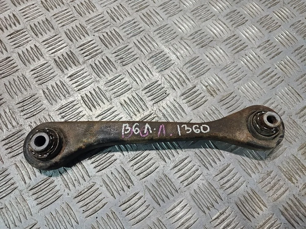 Тяга задней подвески левая Volkswagen Passat B6