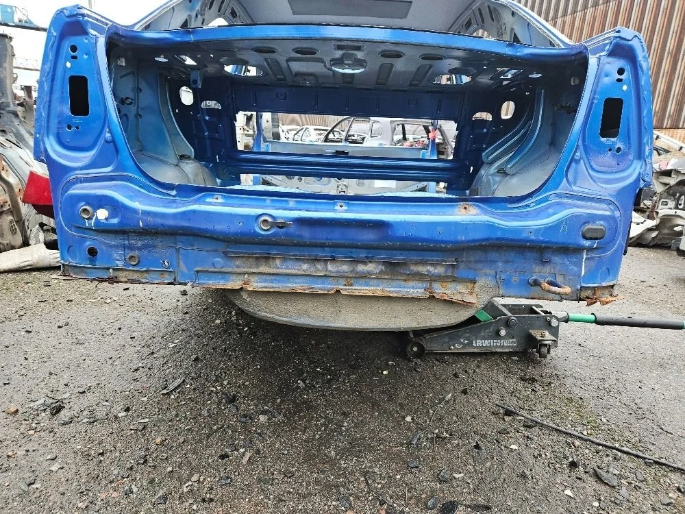 Панель задняя на Renault Logan 1