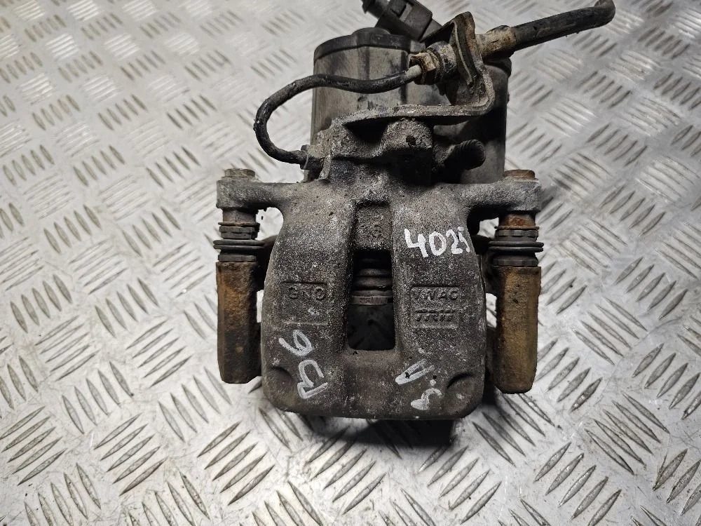 Суппорт задний левый Volkswagen Passat B6