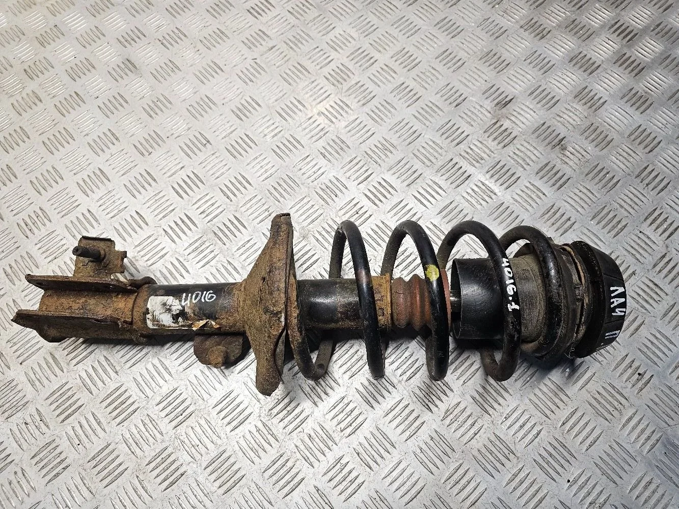 Стойка амортизатора п.л. Chevrolet Lacetti