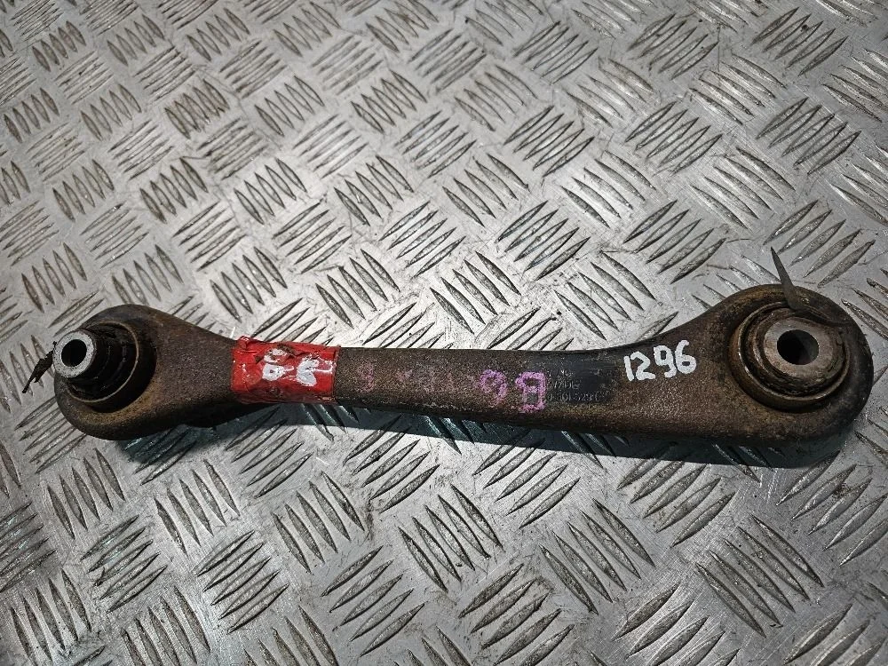 Тяга задней подвески левая Volkswagen Passat B6