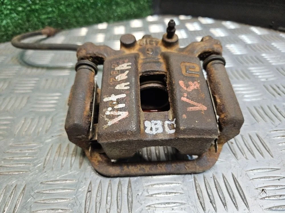 Суппорт задний левый на Suzuki Grand Vitara 2