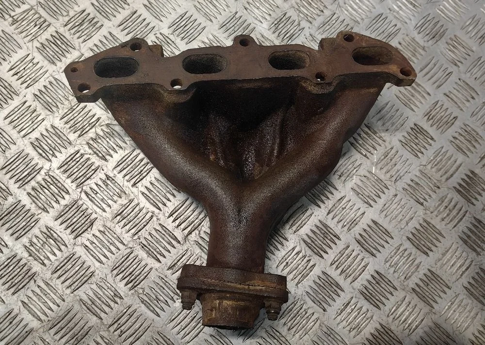 Коллектор выпускной Kia Spectra