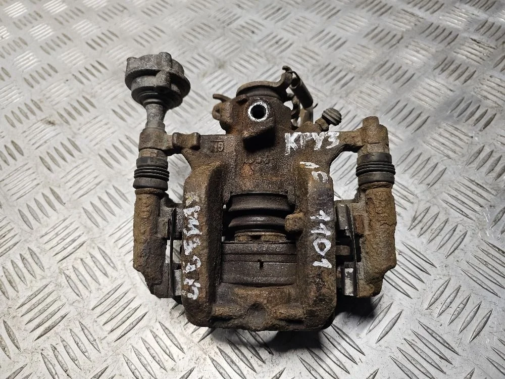 Суппорт тормозной задний правый на Chevrolet Cruze