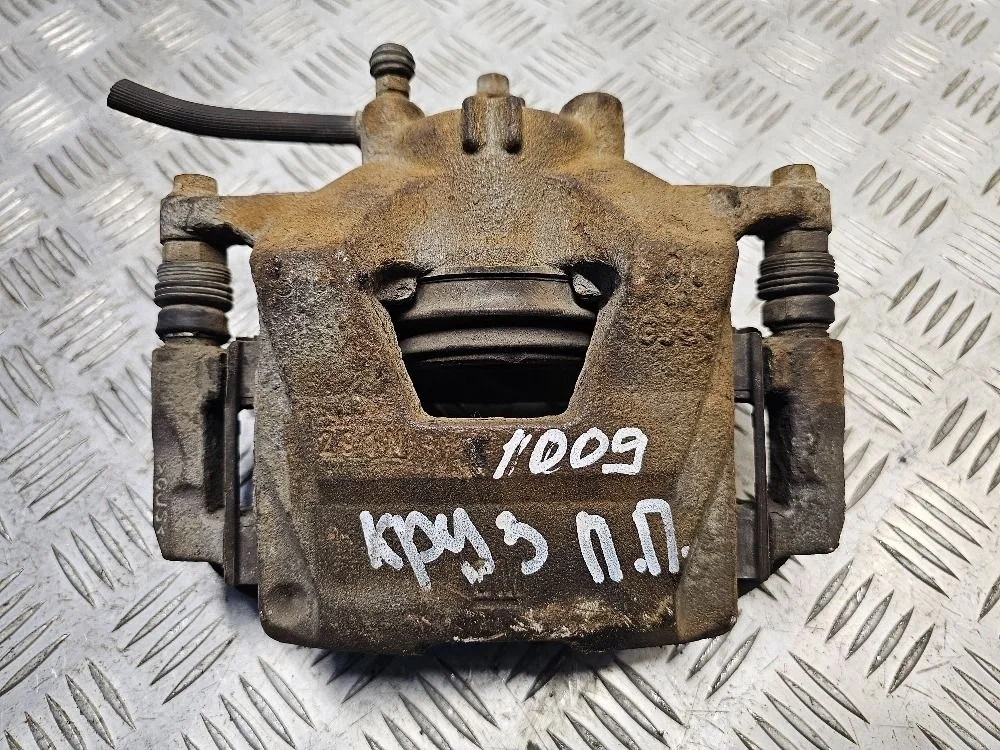 Суппорт тормозной передний правый Chevrolet Cruze