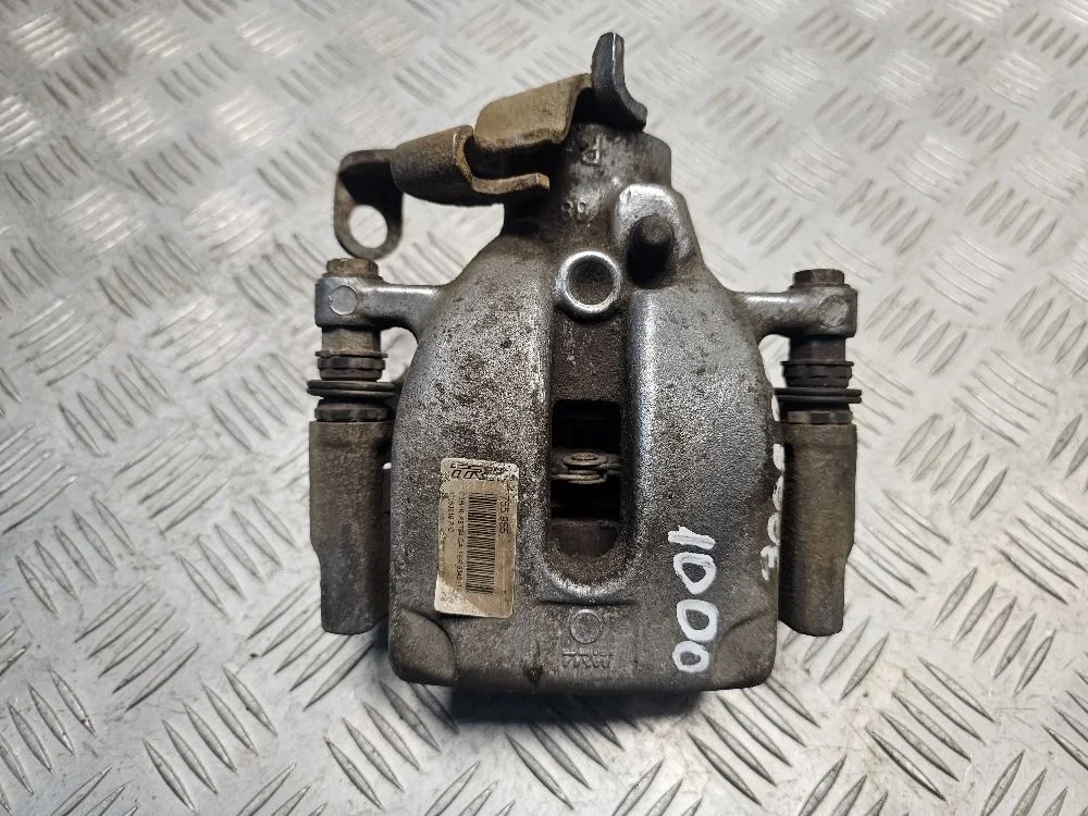 Суппорт тормозной задний правый Peugeot 3008