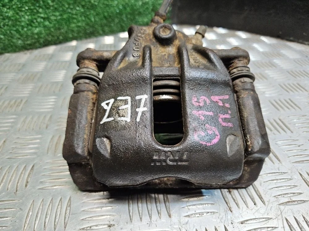 Суппорт передний левый TRW на Nissan Almera G15