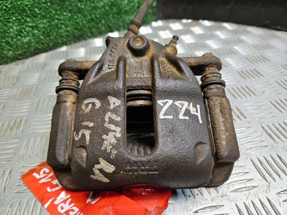 Суппорт передний левый TRW на Nissan Almera G15