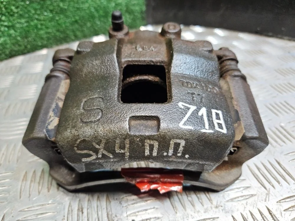 Суппорт тормозной передний правый Suzuki SX-4