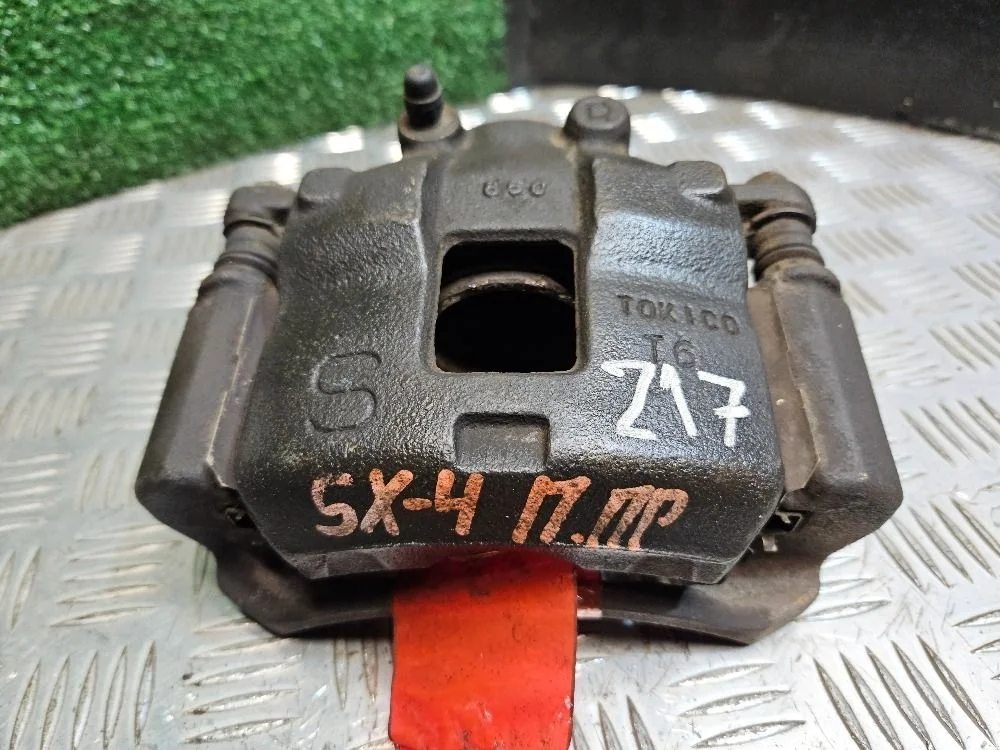 Суппорт тормозной передний правый Suzuki SX-4