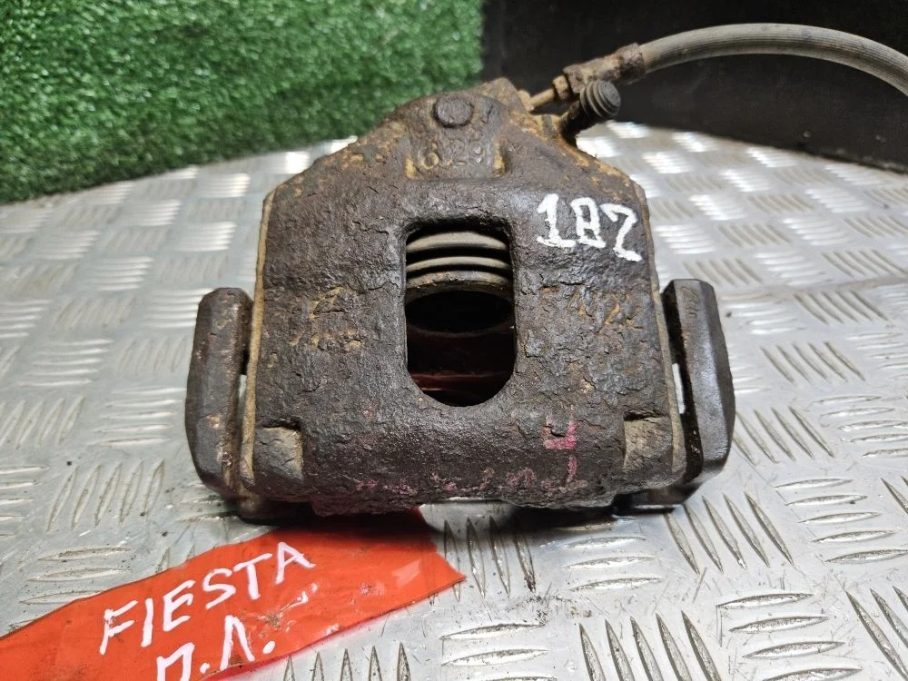 Суппорт передний левый на Ford Fiesta