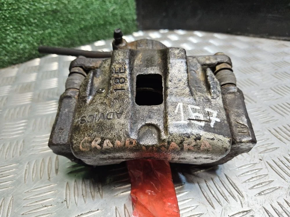 Суппорт передний левый Suzuki Grand Vitata 2