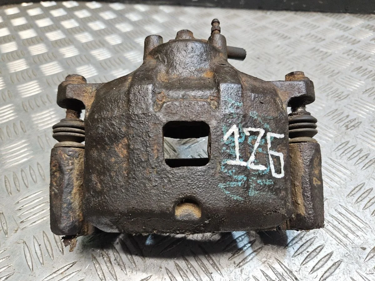 Суппорт передний левый на Mitsubishi Lancer 10