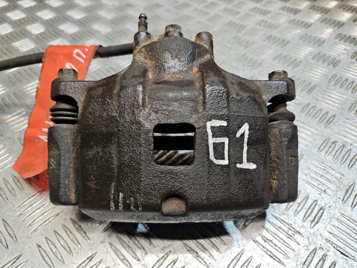 Суппорт передний правый на Mitsubishi Lancer 10