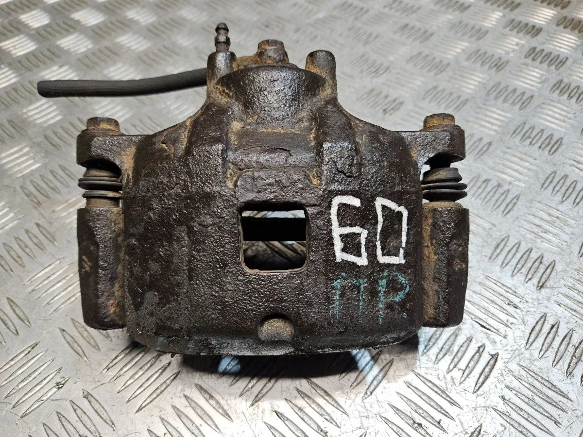 Суппорт передний правый на Mitsubishi Lancer 10