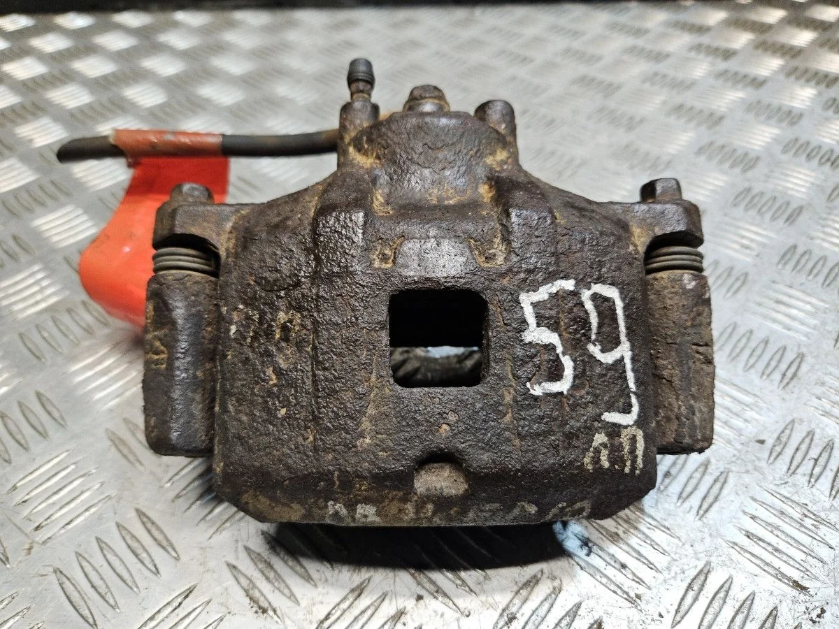 Суппорт передний правый на Mitsubishi Lancer 10