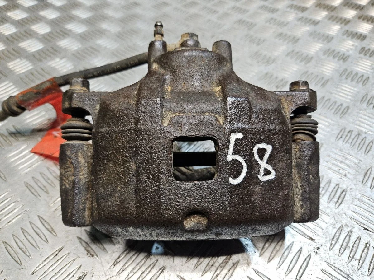 Суппорт передний правый на Mitsubishi Lancer 10