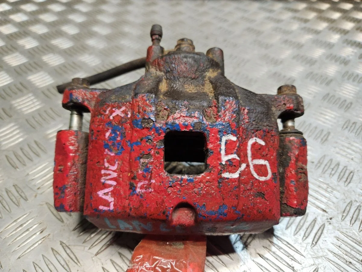 Суппорт передний правый на Mitsubishi Lancer 10