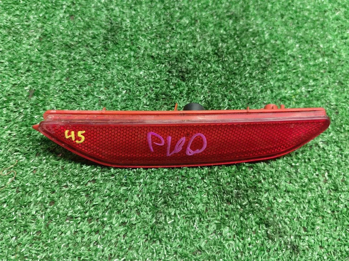 Отражатель бампера задний левый Kia Rio III