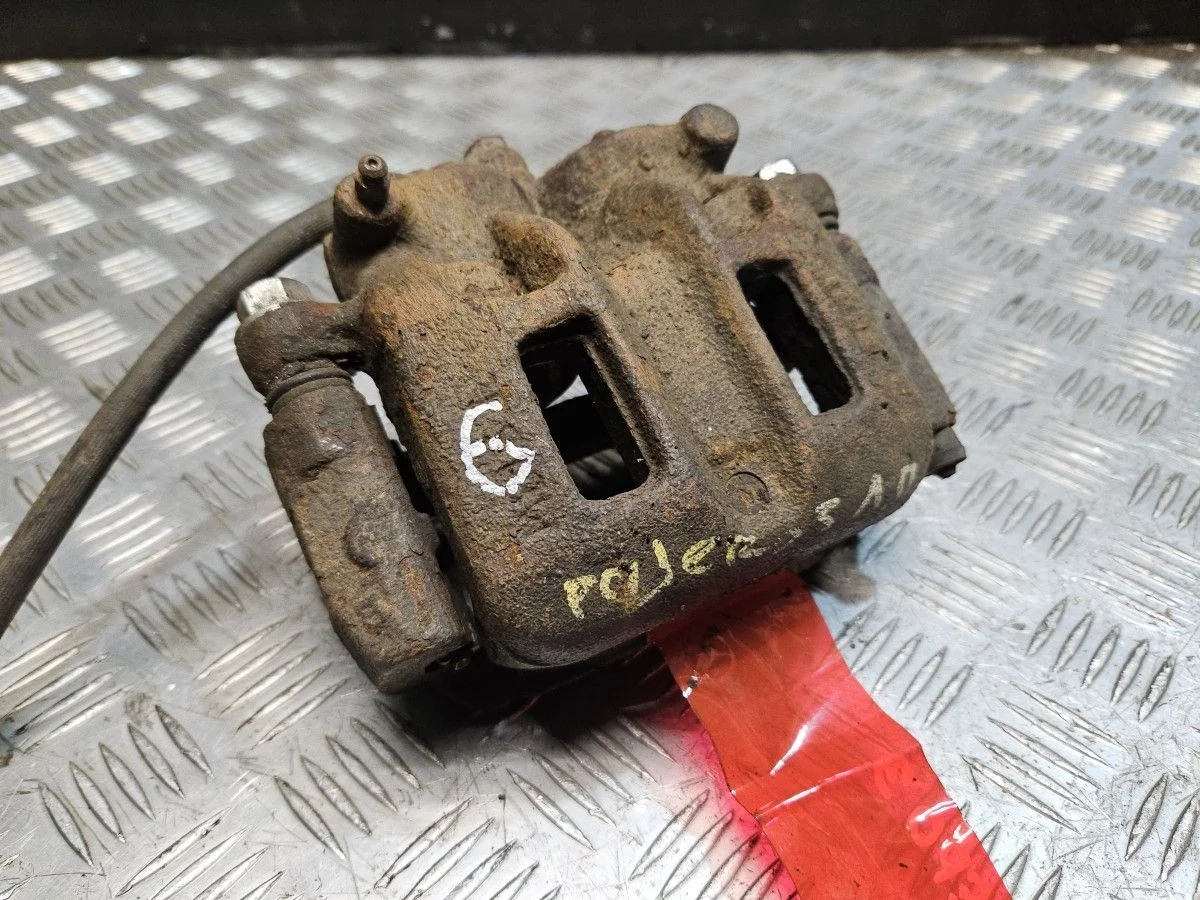 Суппорт передний левый 2х поршневой с Pajero 3