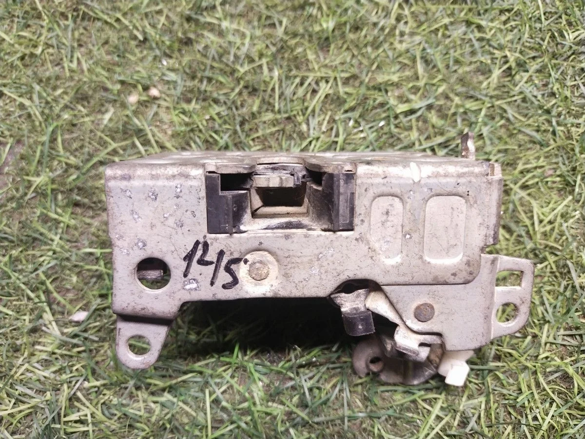 Замок двери задний левый Renault Logan